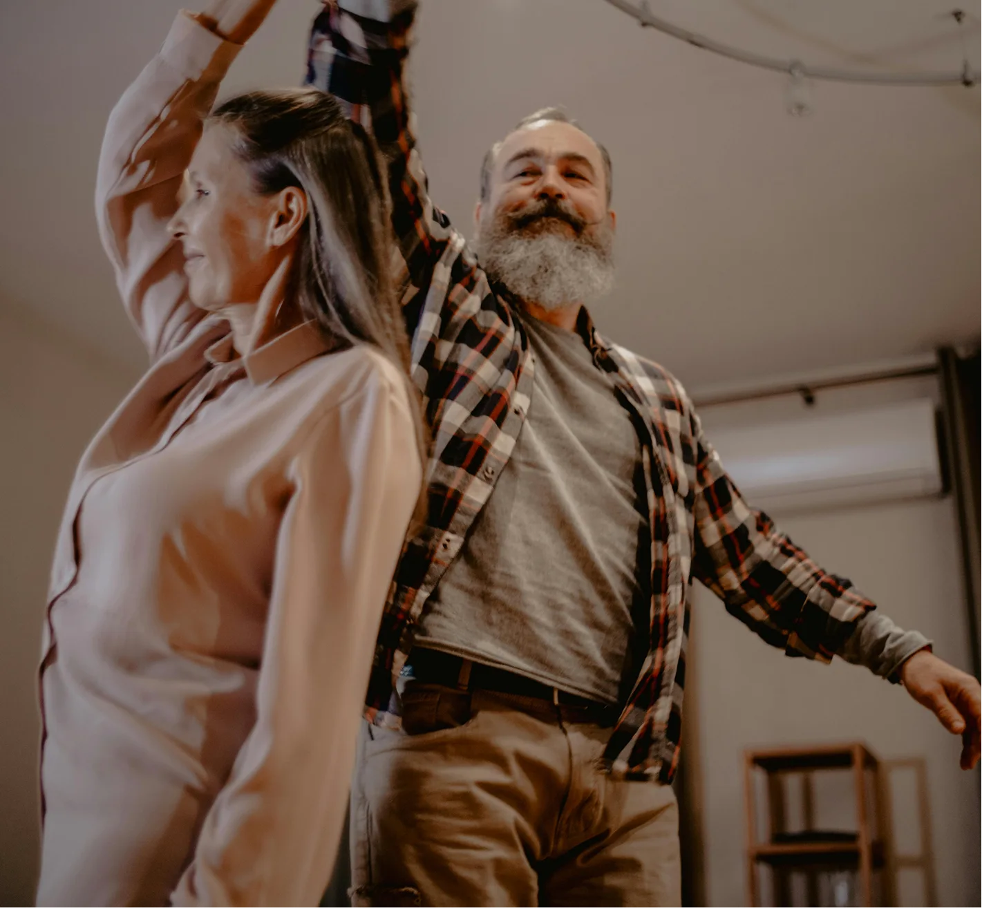 Illustrative photograph of a couple dancing, representing an everyday activity goal
